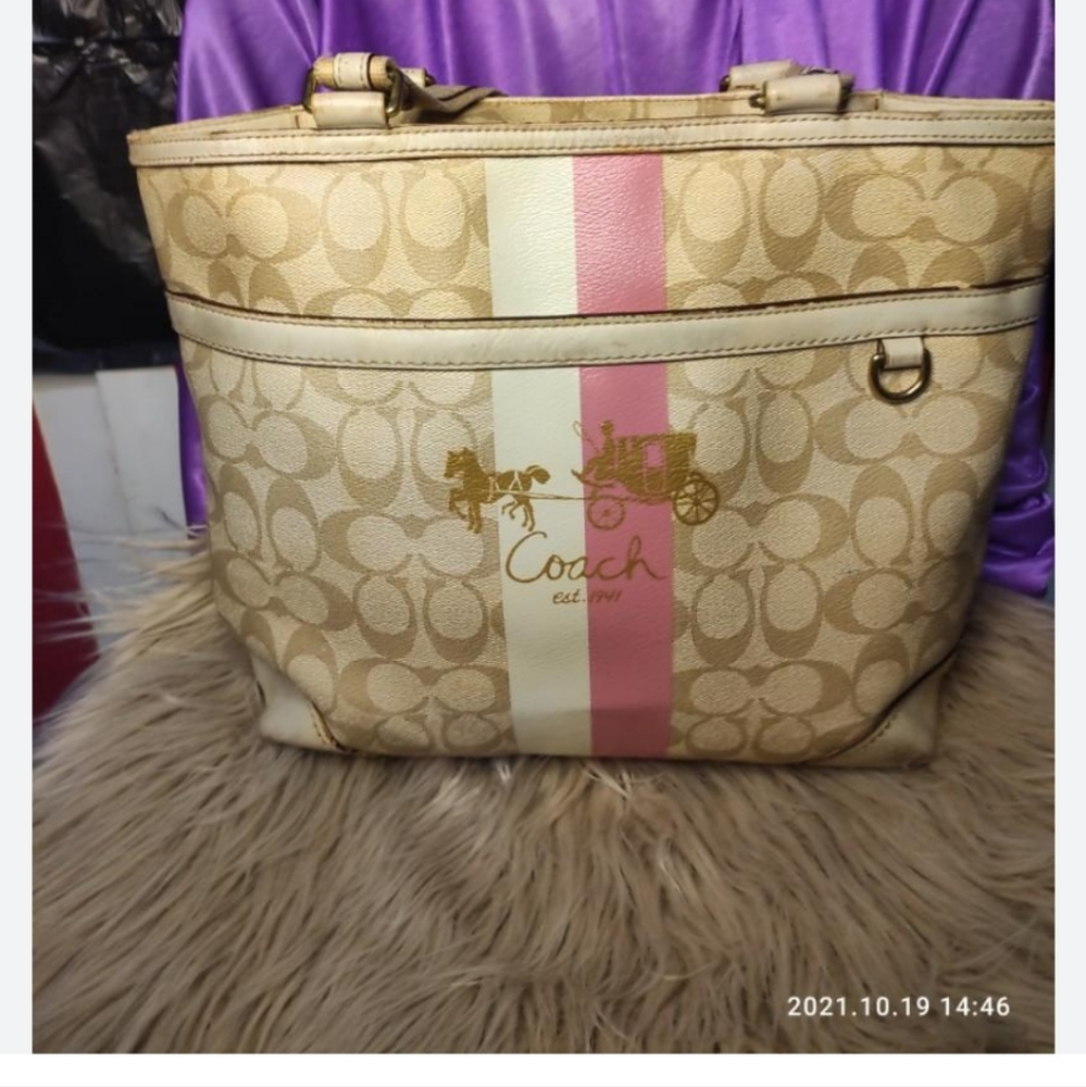 Coach Pink/Beige Heritage Handbag with matching wallet.